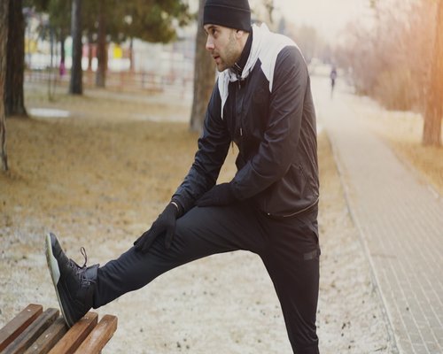 Active man stretching outdoors
